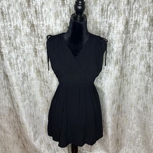 Black mini dress with tie front and tie sides detail